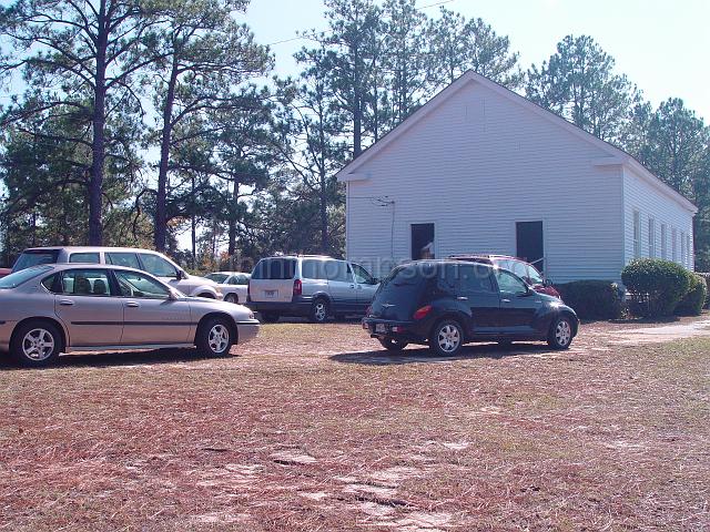 DSC01949.JPG - some of the congregation vehicles parked outside the Ebenezer Methodist Church on November 19, 2006