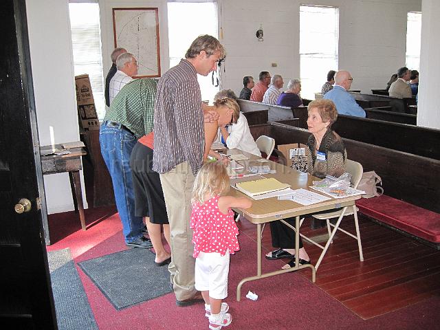 reubinthompson_org_14.jpg - Signing in and getting their name tags.